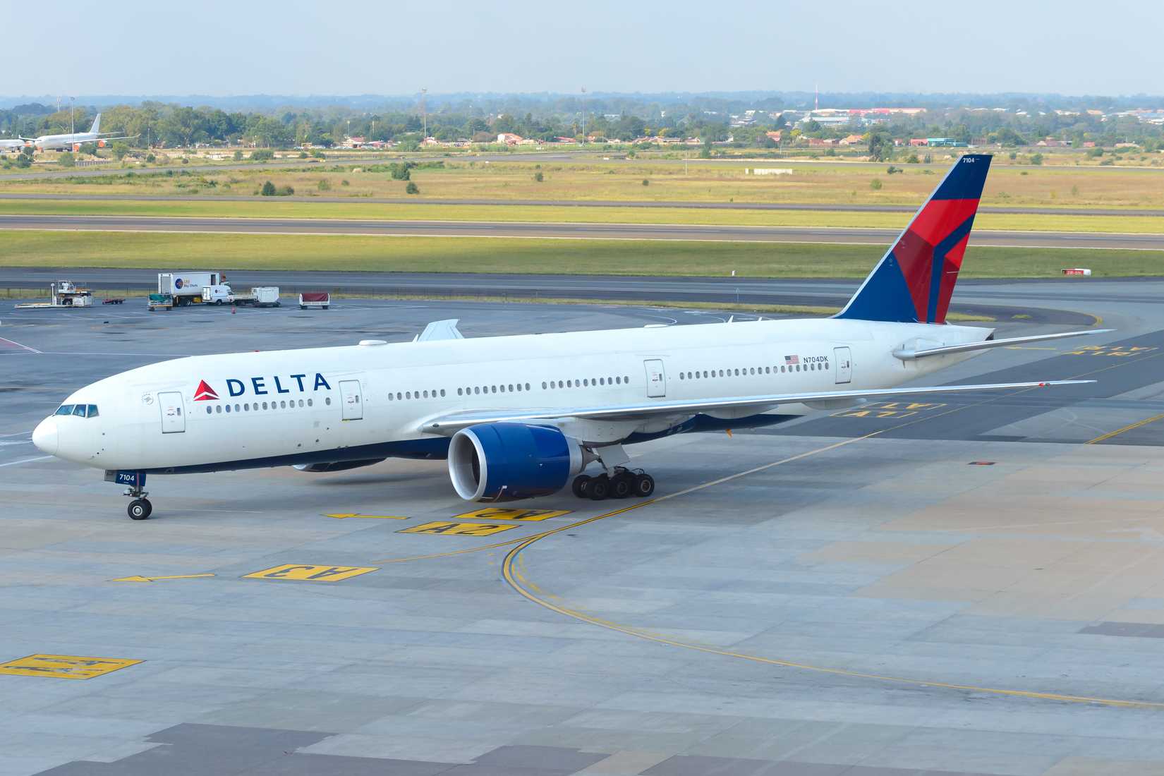 Delta Airlines Boeing 777 registered as N704DK arriving in Africa continent. Long haul flight from Atlanta. Airplane 777-200LR.