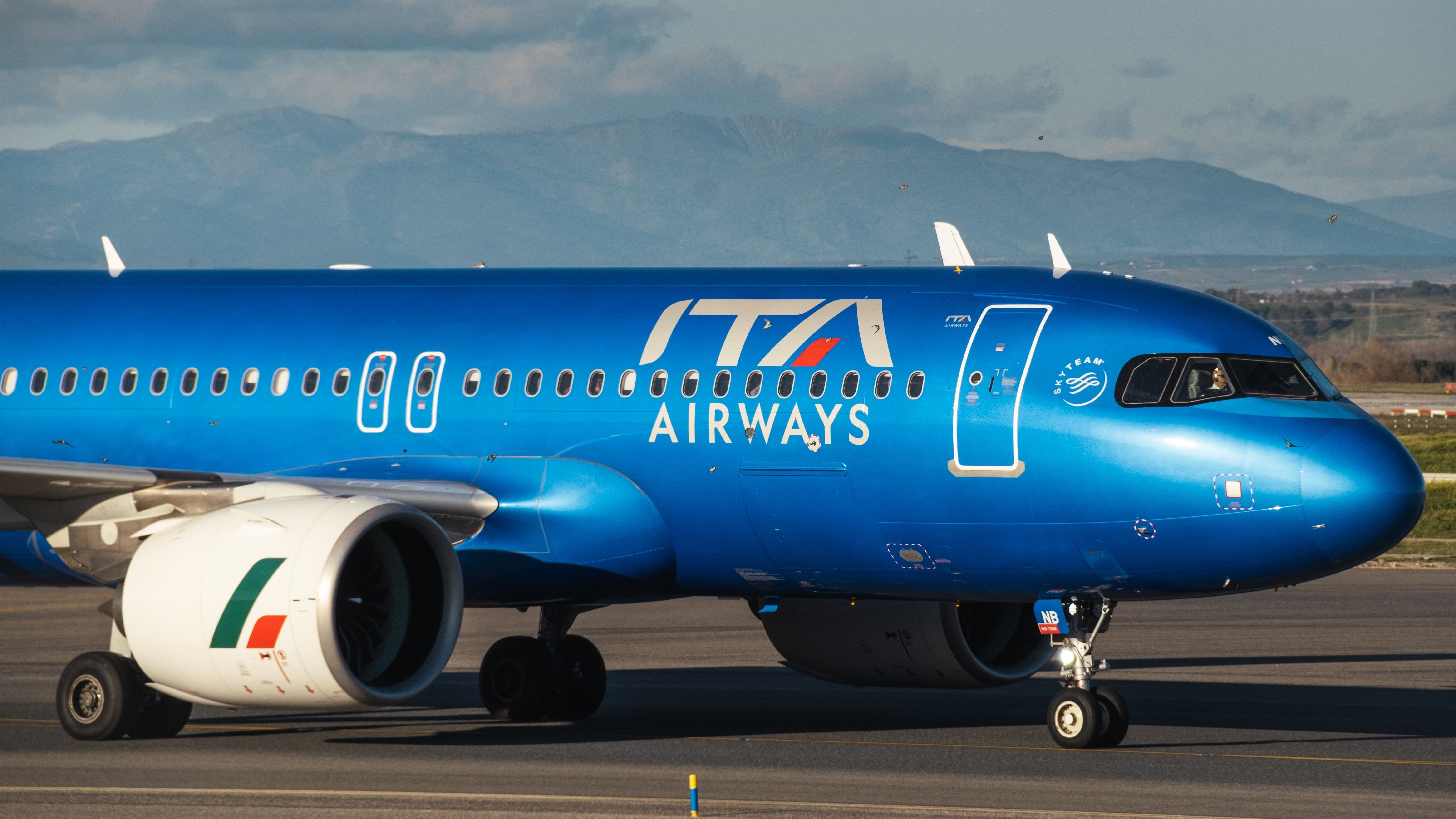 A320-272N aircraft of ITA Airways airlines with blue livery taxing before departure in Madrid-Barajas Airport