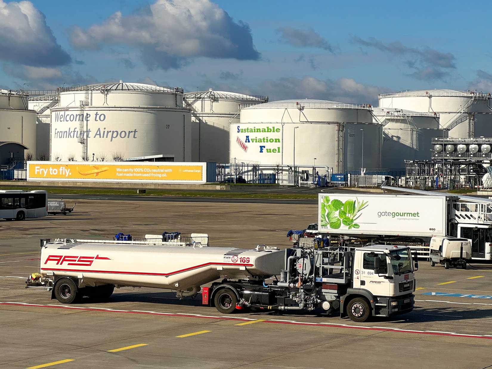 Sustainable Aviation Fuel advertisment on fuel storage at Frankfurt airport