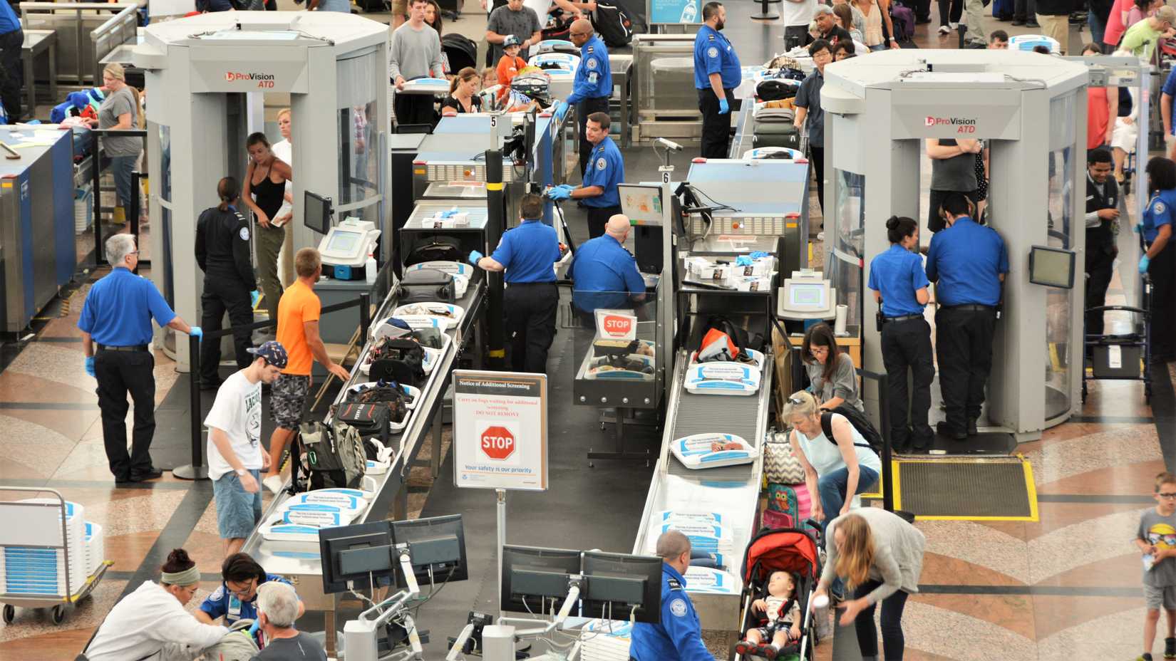 An Aerial View Of A Security Checkpoint At Denver International