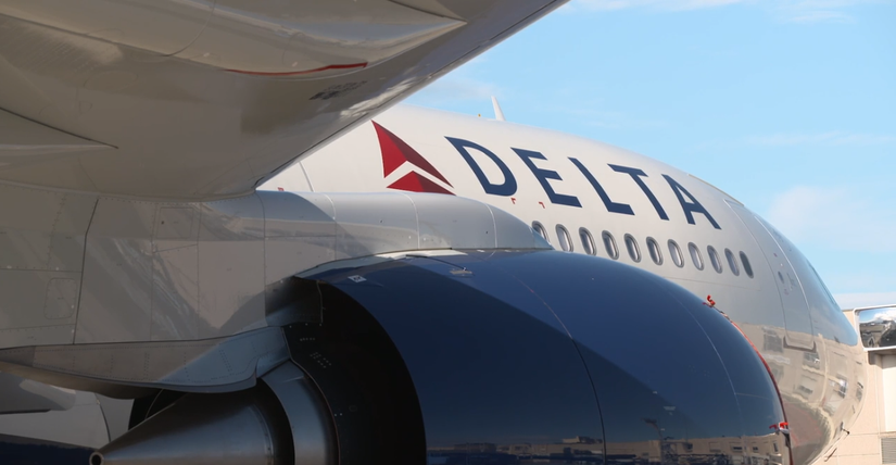 A Delta A330-900 close up of the fueslage
