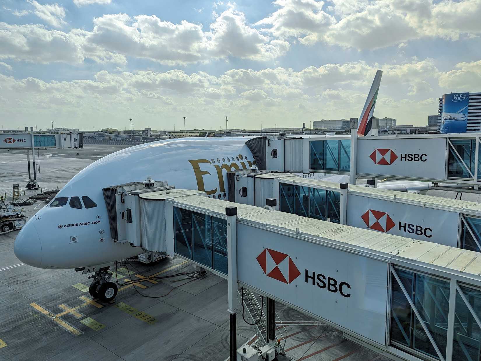 Emirates Airbus A380 sits at a gate at Dubai International Airport
