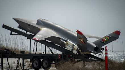 Marine Corps XQ-58A Valkyrie, highly autonomous, low-cost tactical unmanned air vehicle, prepares to launch.