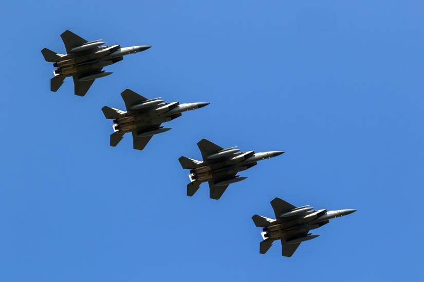 US Air Force F-15 Eagle fighter jet formation over Leeuwarden Air Base.