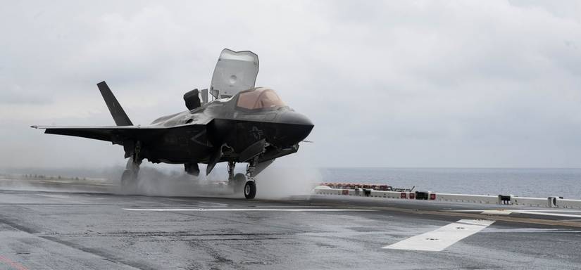 An F-35B Lightning II aircraft from a Marine Fighter Attack Squadron takes off from the flight deck