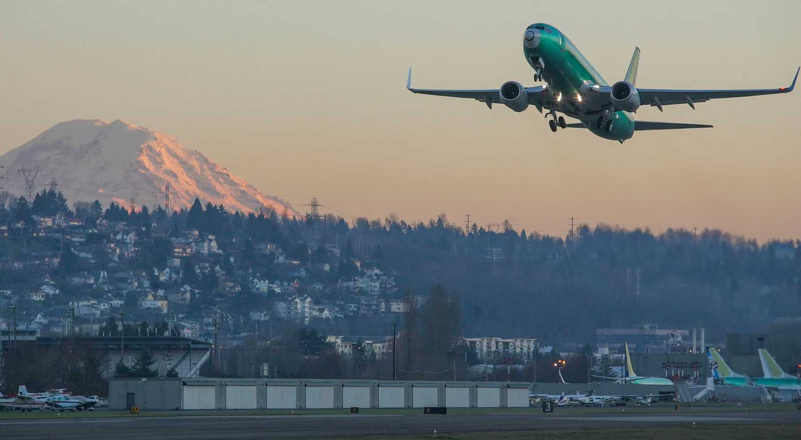 A brand new and yet unpainted Boeing 737 takes off from Renton Municipal Airport on Jan. 17, 2009, in Renton, Wash. The airfield adjoins the Boeing Renton Factory.