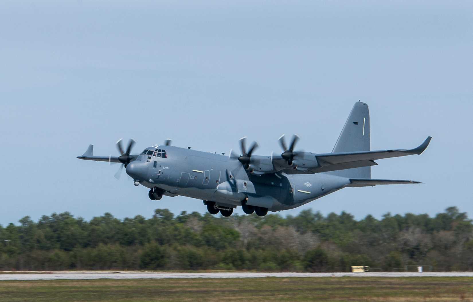 A modified MC-130J lifts off from Eglin Air Force Base, Fla., for a test mission.