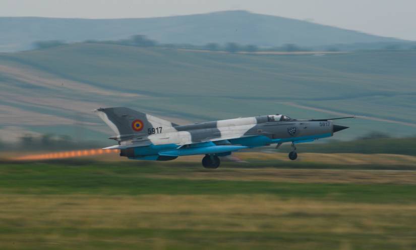 A Romanian MiG-21 fighter aircraft takes off during the 2015 Campia Turzii Air Show July 19, 2015.-1