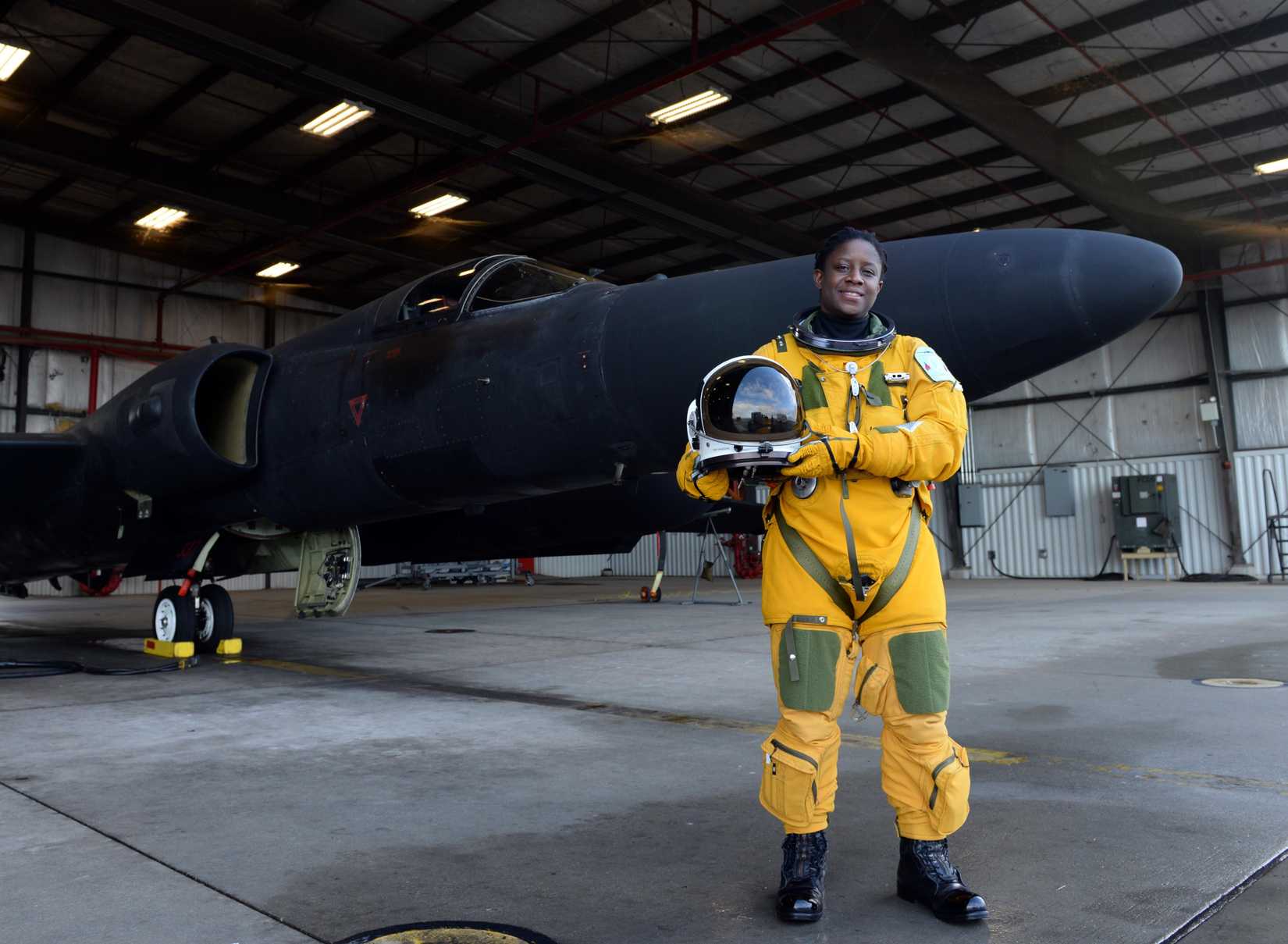 Air Force Lt. Col. Merryl Tengesdal stands in front of a U-2 at Beale Air Force Base, Calif., Feb. 9, 2015.