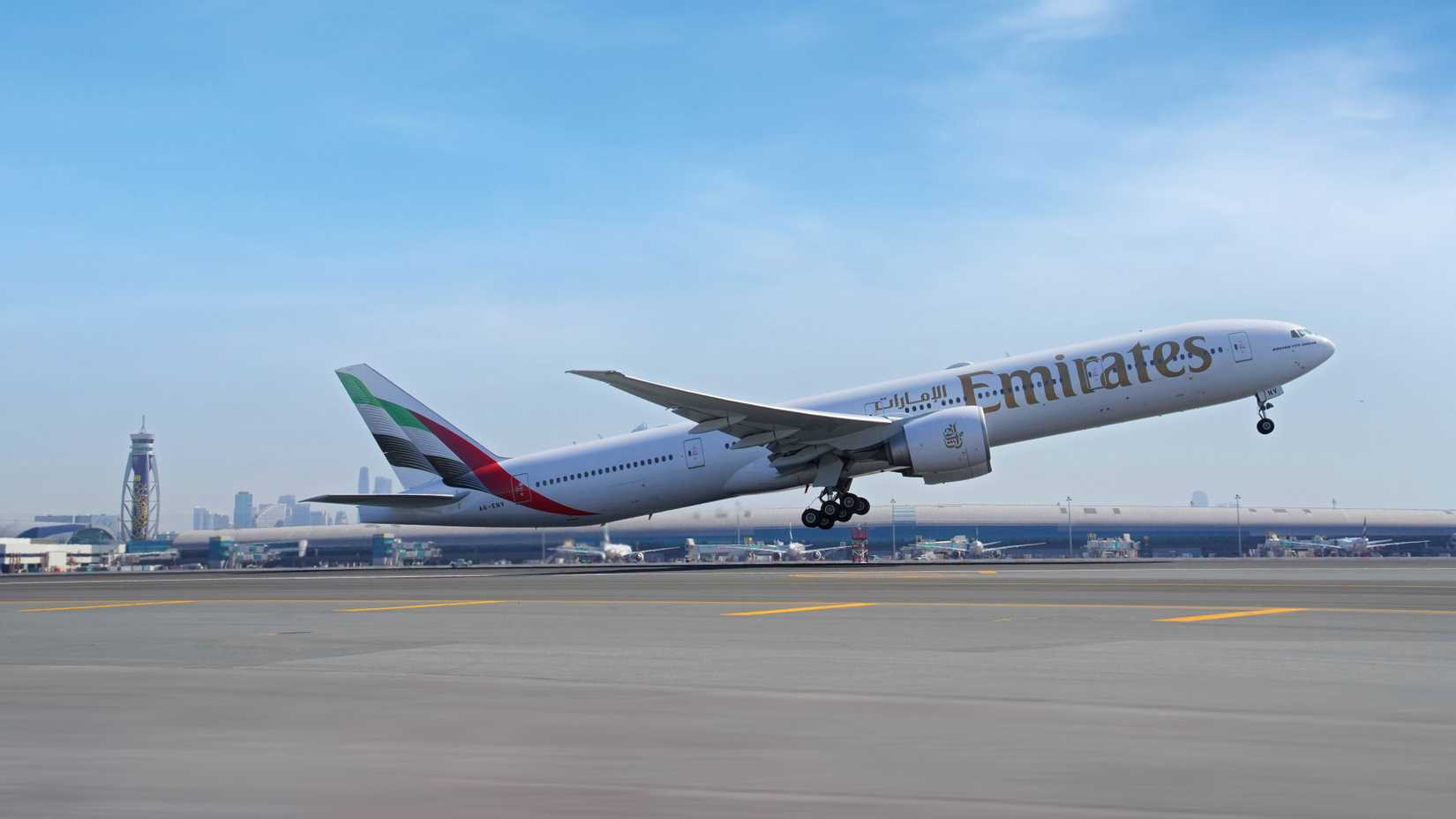 Emirates Boing 777-300ER take off from Dubai International Airport.