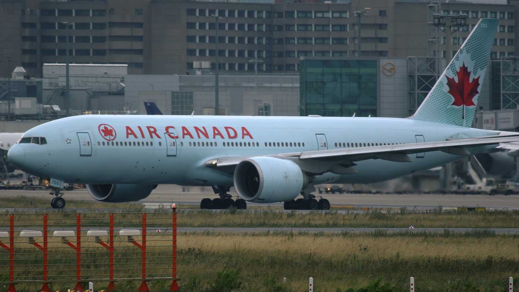  Side view of Boeing 777 C-FIUJ of Air Canada airlines in Frankfurt am Main