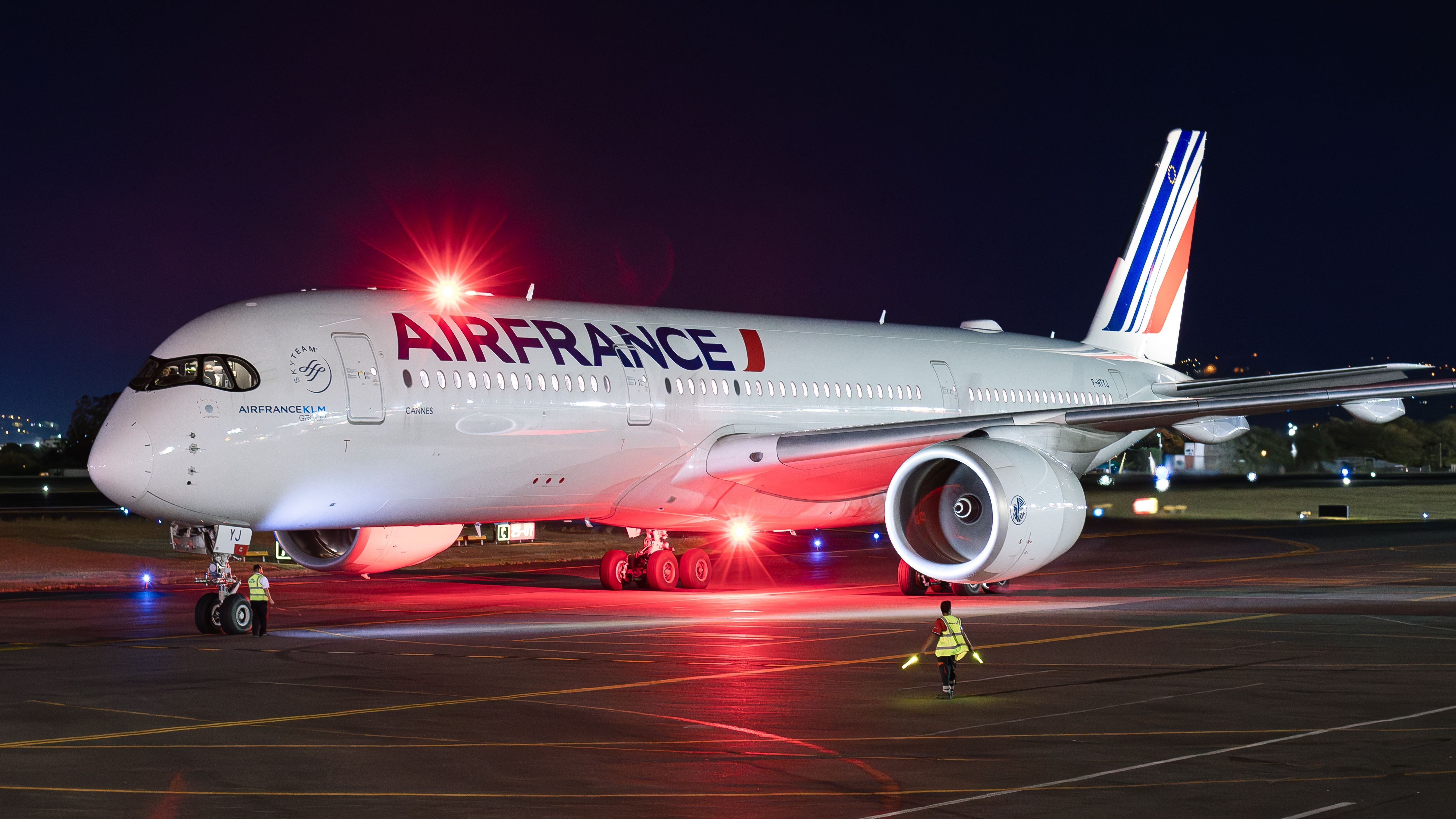 An Air France A350-900 parked at an airport