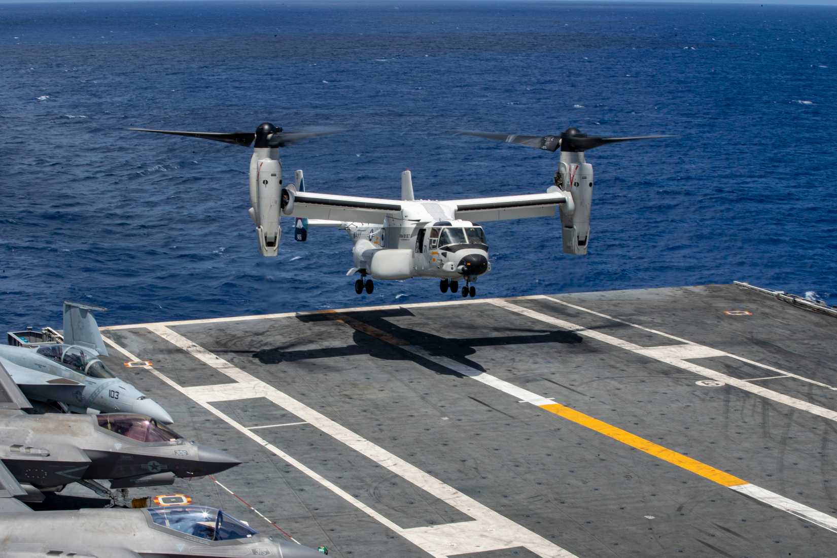 A CMV-22B Osprey, attached to Fleet Logistics Multi-Mission Squadron (VRM) 30, lands on the flight deck of Nimitz-class aircraft carrier USS George Washington (CVN 73).