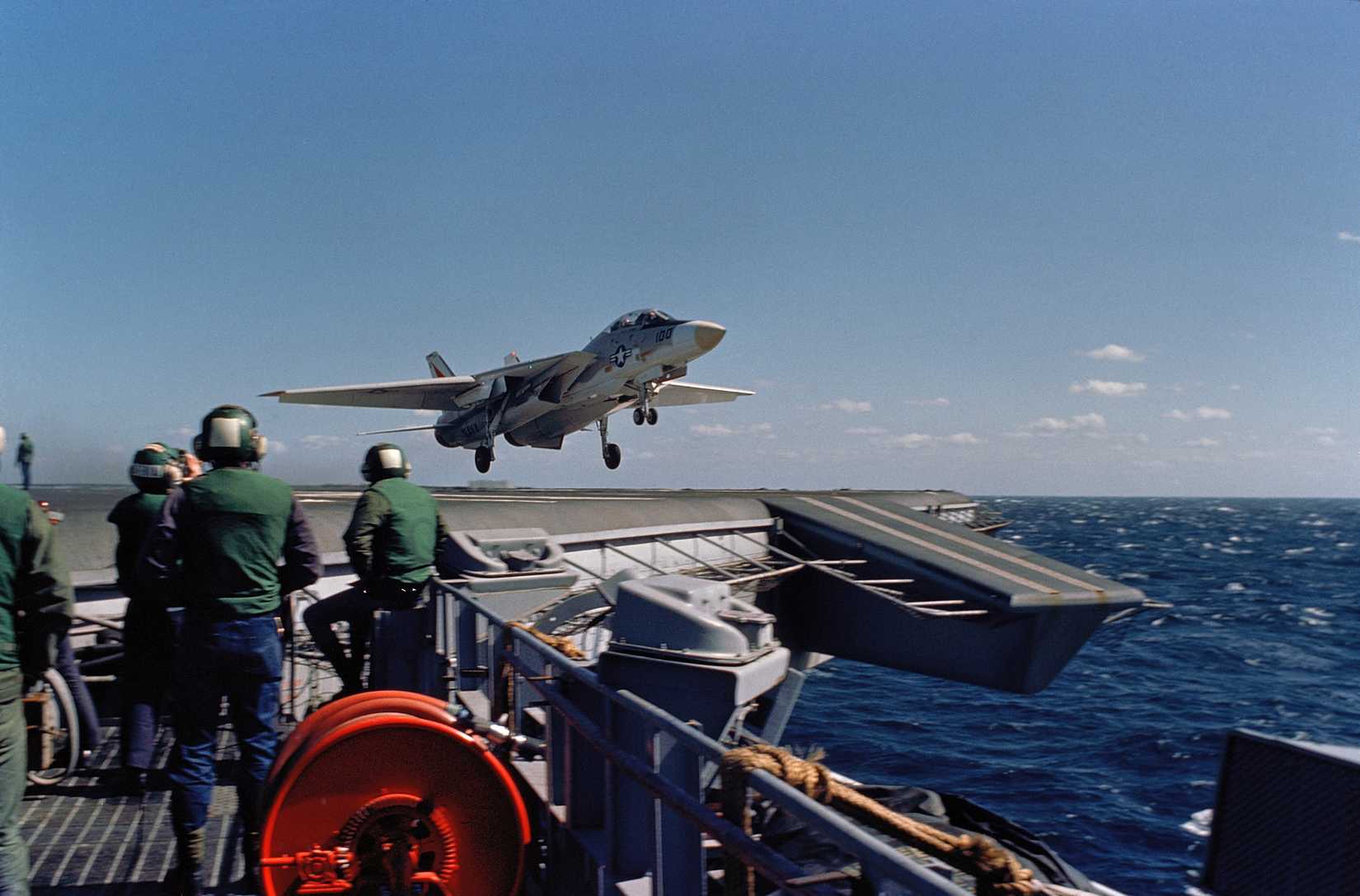 A Fighter Squadron 14 (VF-14) F-14 Tomcat aircraft clears the flight deck after a wave-off during flight operations aboard the aircraft carrier USS JOHN F. KENNEDY (CV 67)