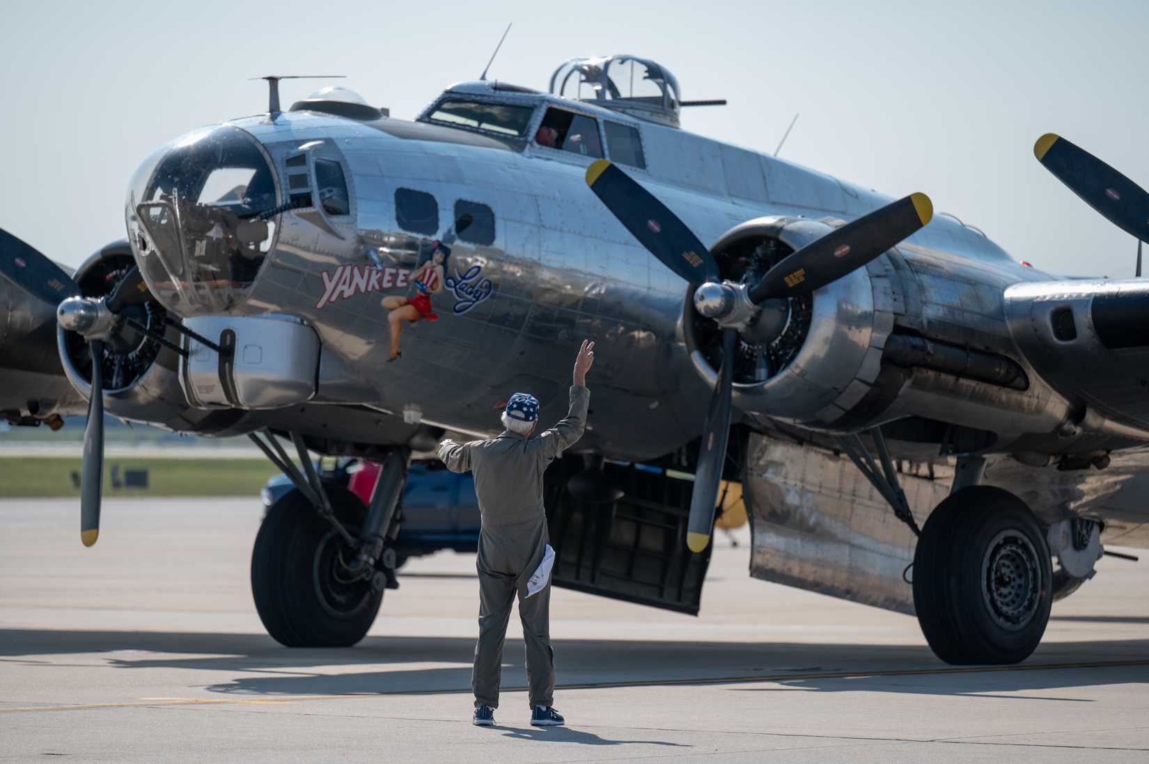 A member of the Yankee Air Force prepares the B-17 Yankee Lady for its aerial display at Joint Base Andrews 2022 Air & Space Expo