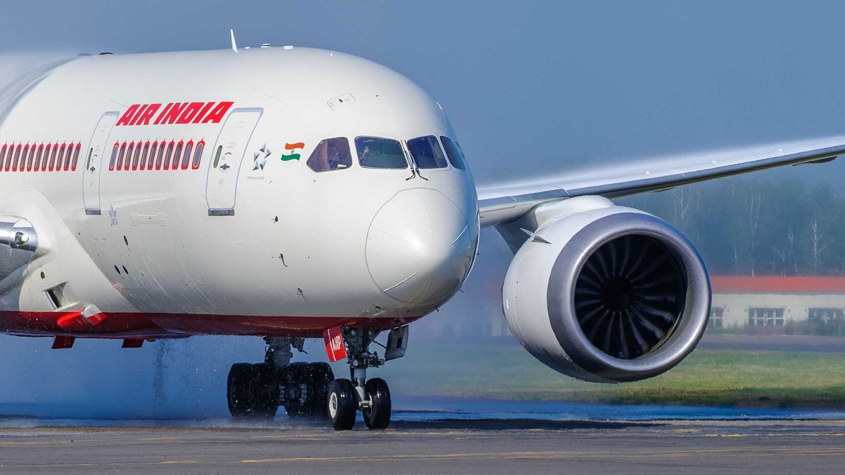 A water salute ceremony on the airport apron to mark the first arrival of Air India's Boeing 787 Dreamliner aircraft with flight number VT-ANP at Moscow Domodedovo Airport, Russia, 2014.-1