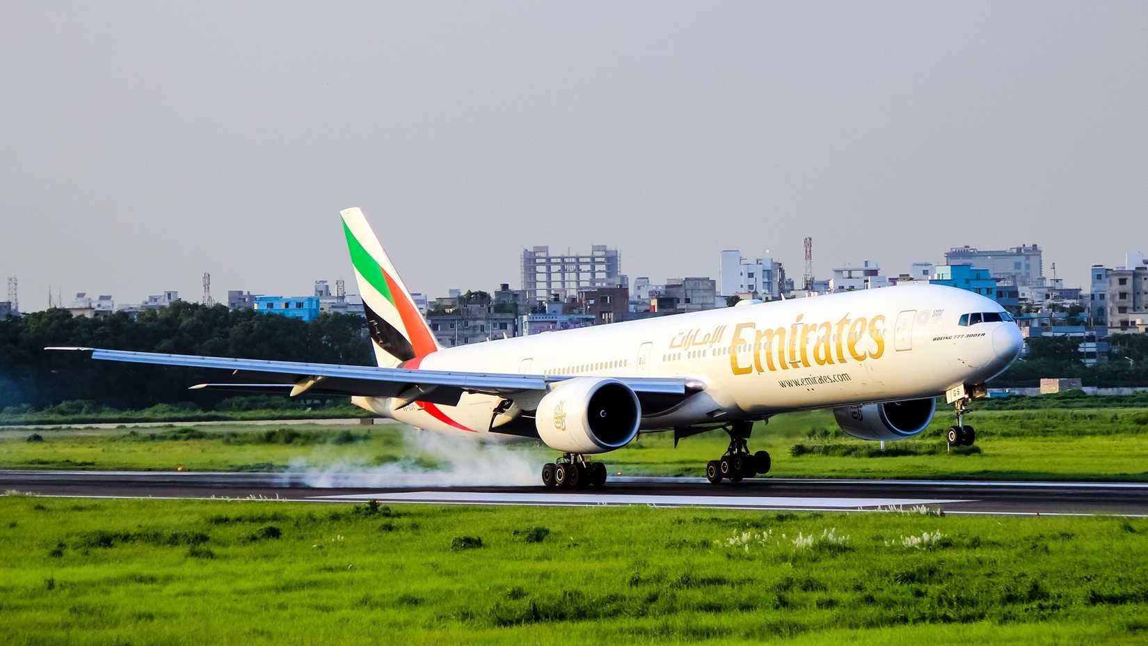 Emirates Boeing 777-31H/ER (A6-EGS) touching down.