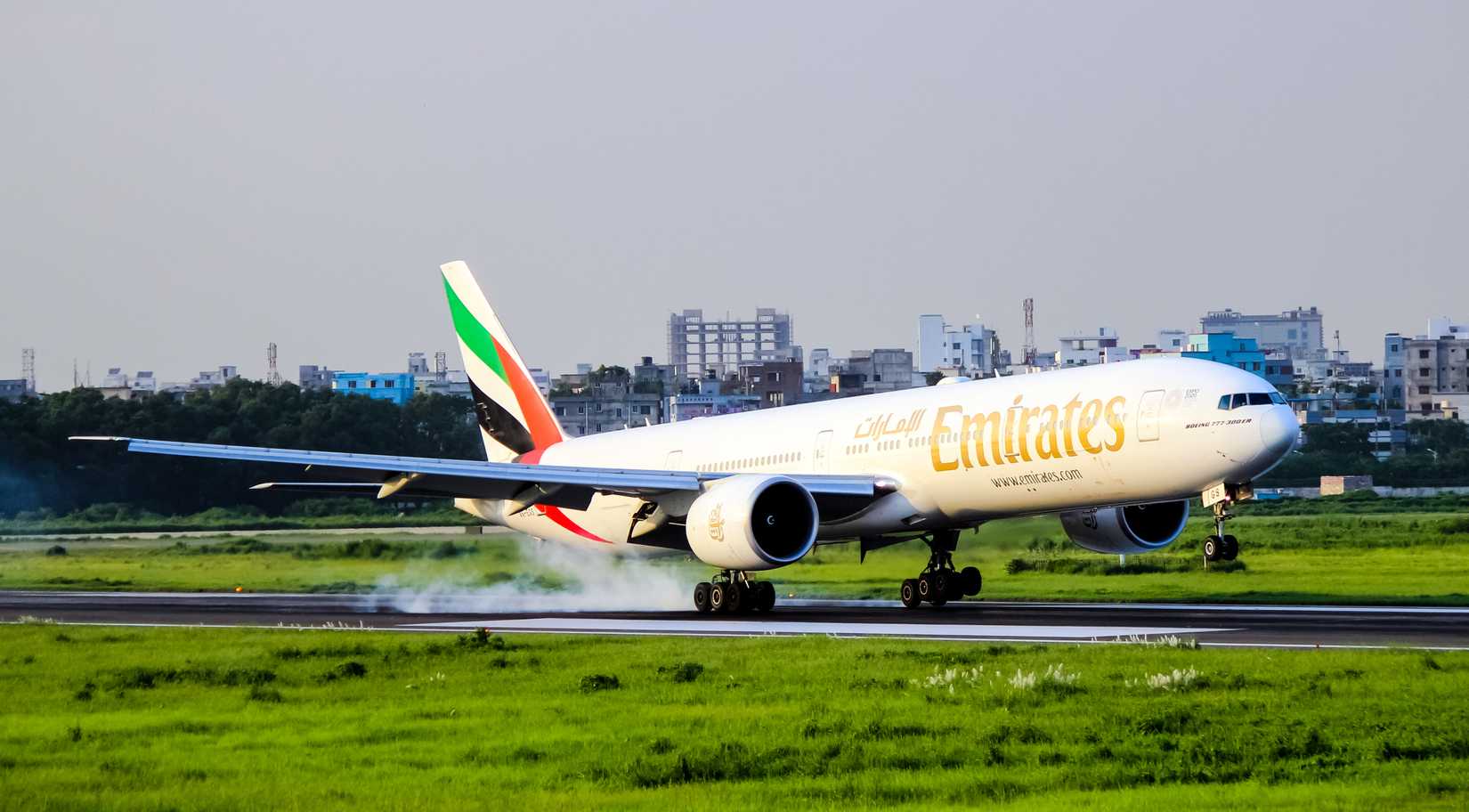 Emirates Boeing 777-31H/ER (A6-EGS) touching down.