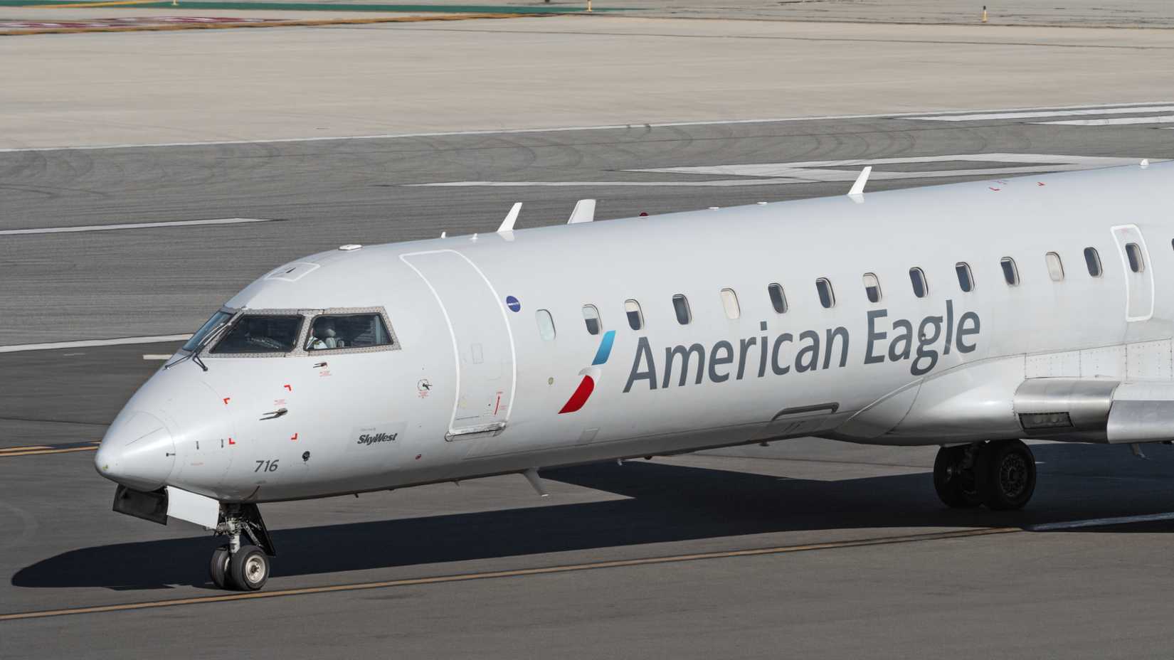 American Airlines Bombardier CRJ-700 on the runway close up