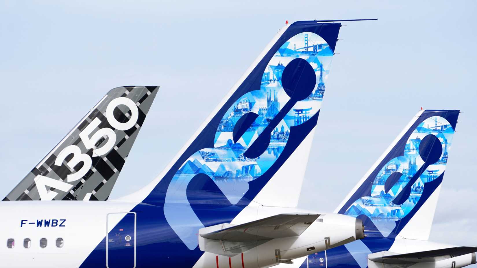 Airbus A320neo and A350 aircraft tails close up 