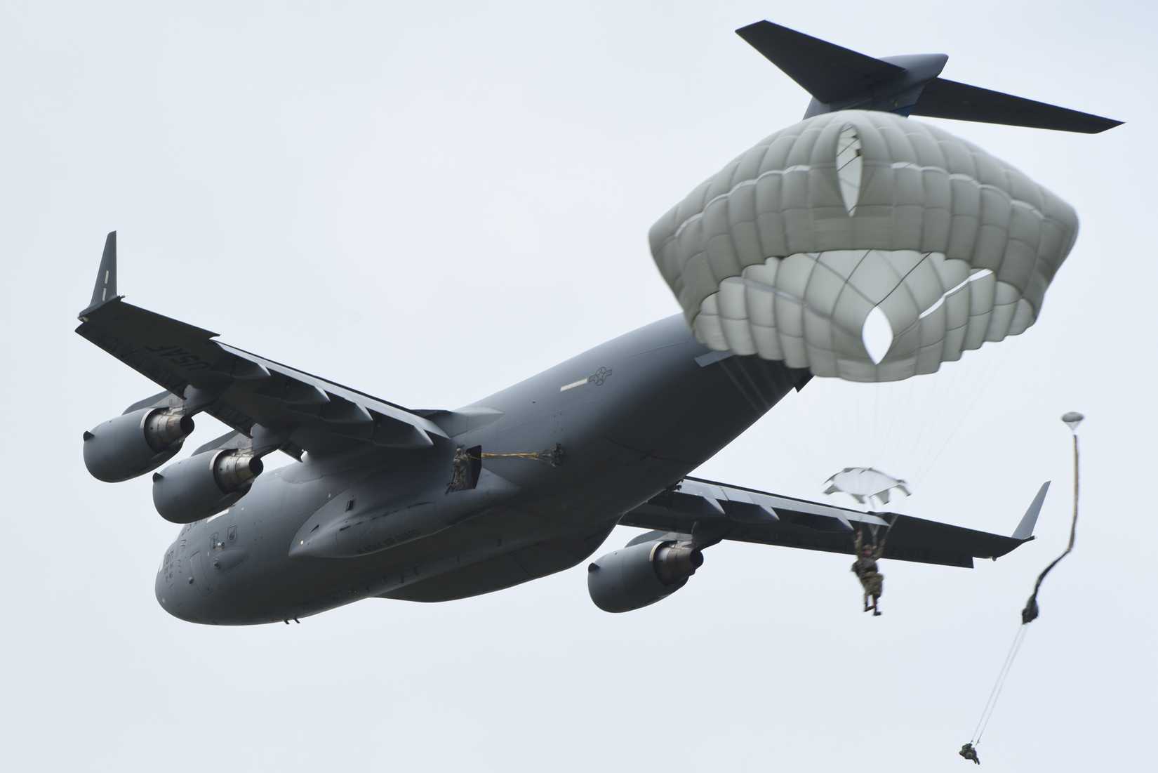 Air Force Airmen assigned to 1st Air Support Operations Group from Joint Base Lewis-McCord, Wash., conduct airborne operations from a C-17.