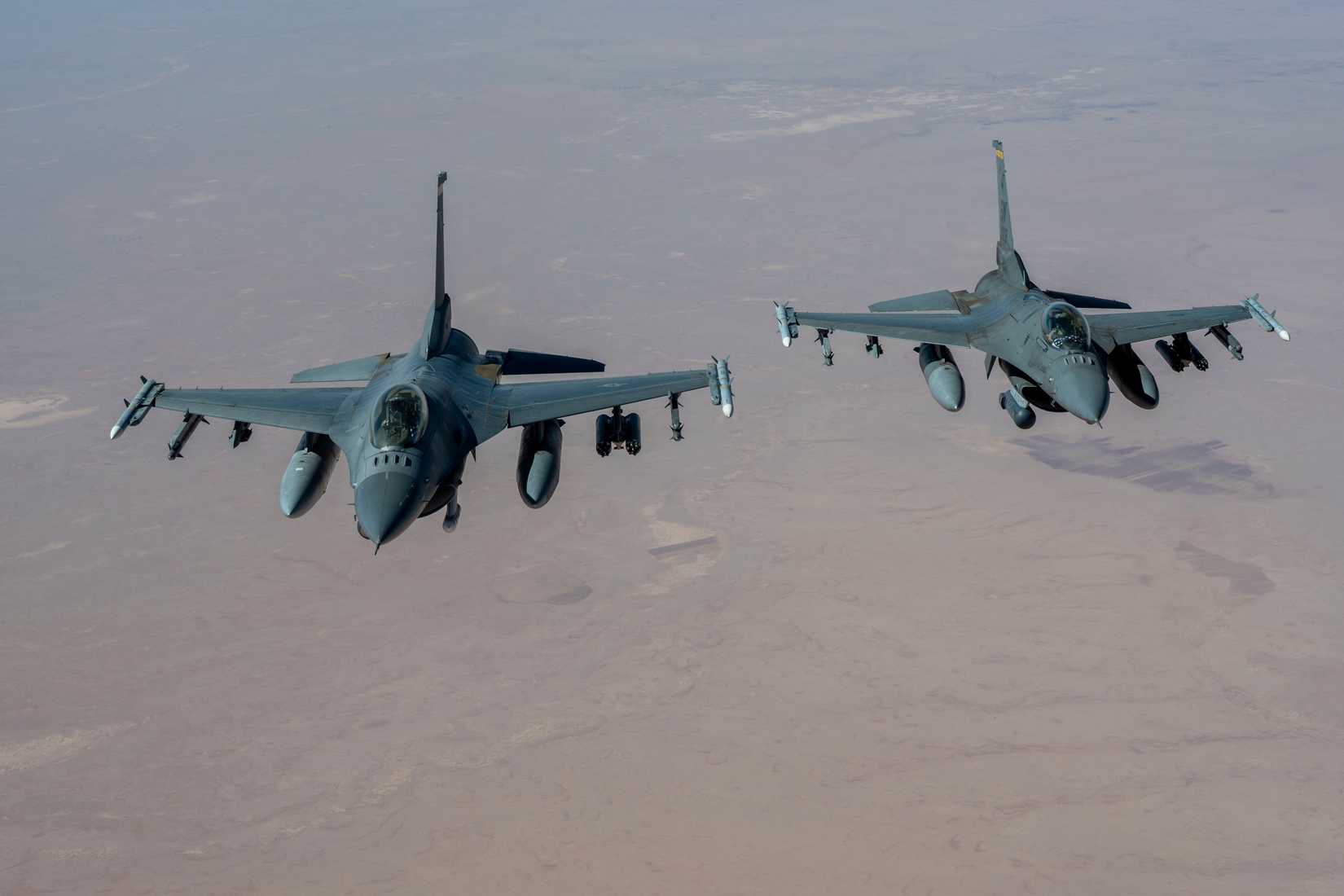 Air Force F-16C Fighting Falcons fly in formation over the U.S. Central Command area of responsibility, Aug. 19, 2025.