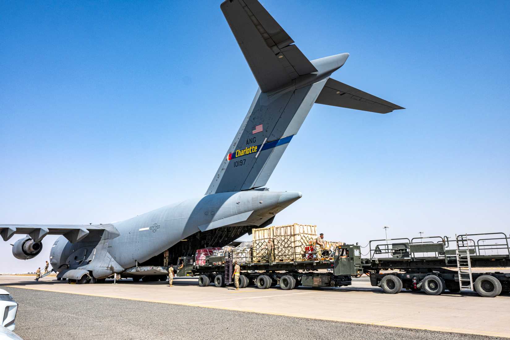 Air Force personnel load humanitarian aid cargo aboard a C-17 Globemaster III within the U.S. Central Command area of responsibility, Sept. 5, 2025.