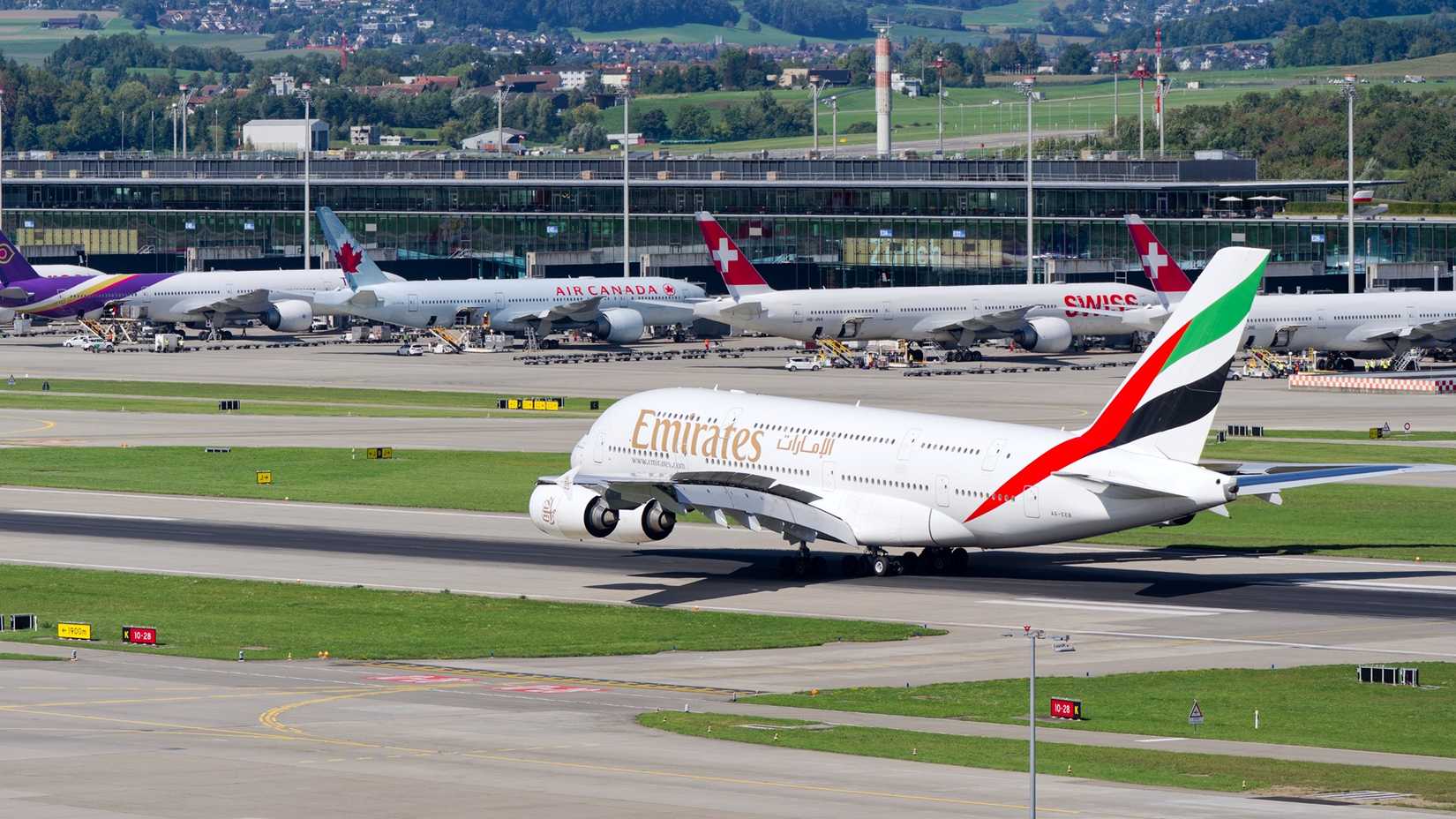 Airbus A380-861 registration A6-EEB landing at Swiss Airport Zürich Kloten on a sunny late summer day.