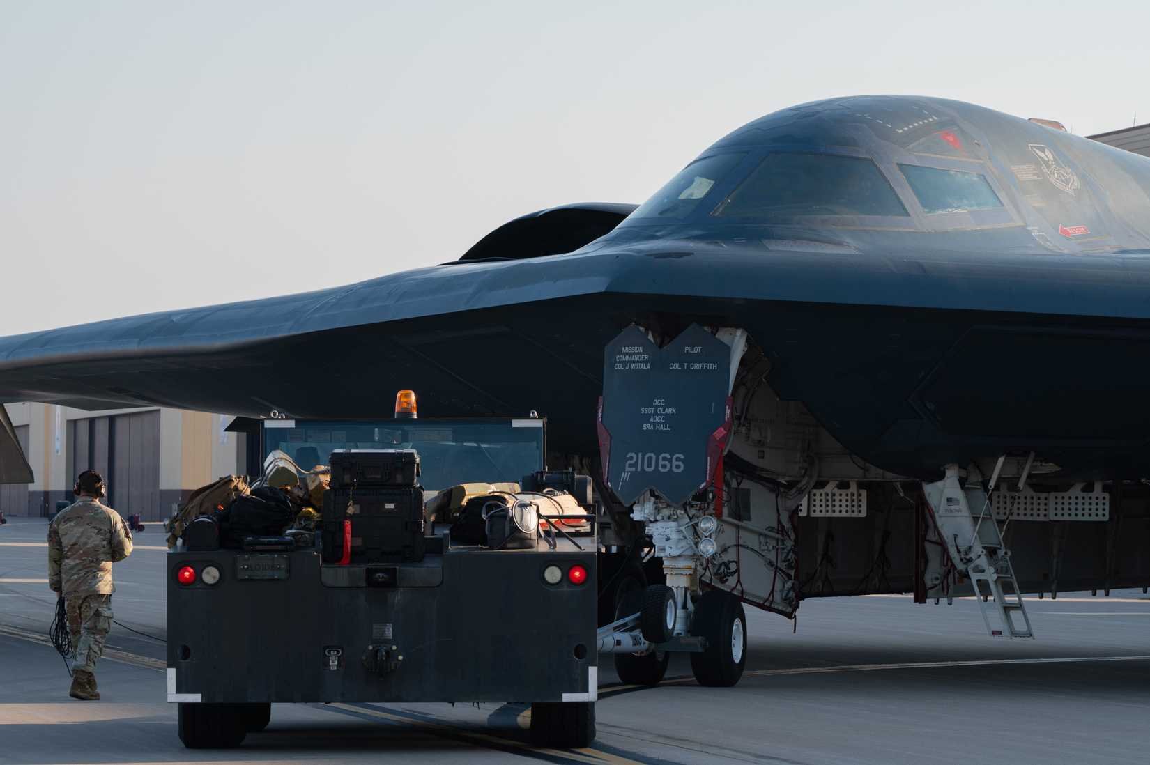 Airmen assigned to the 393rd Bomber Generation Squadron taxi a B-2 Spirit aircraft into a hangar at Whiteman Air Force Base