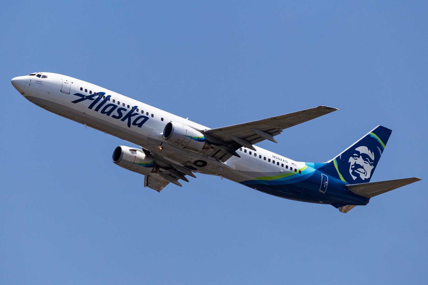 Alaska Airlines passenger plane departing San Diego International Airport.