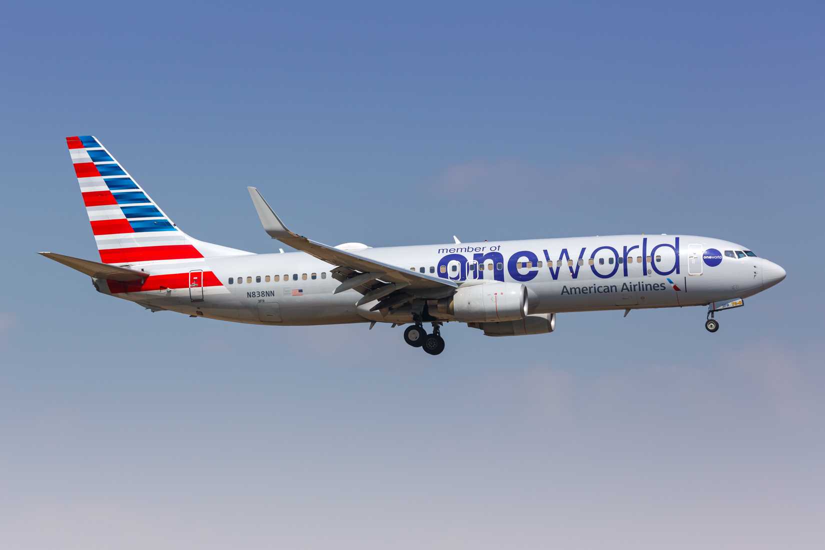 American Airlines Boeing 737-800 airplane with OneWorld special livery at Dallas Fort Worth Airport (DFW) in the United States.