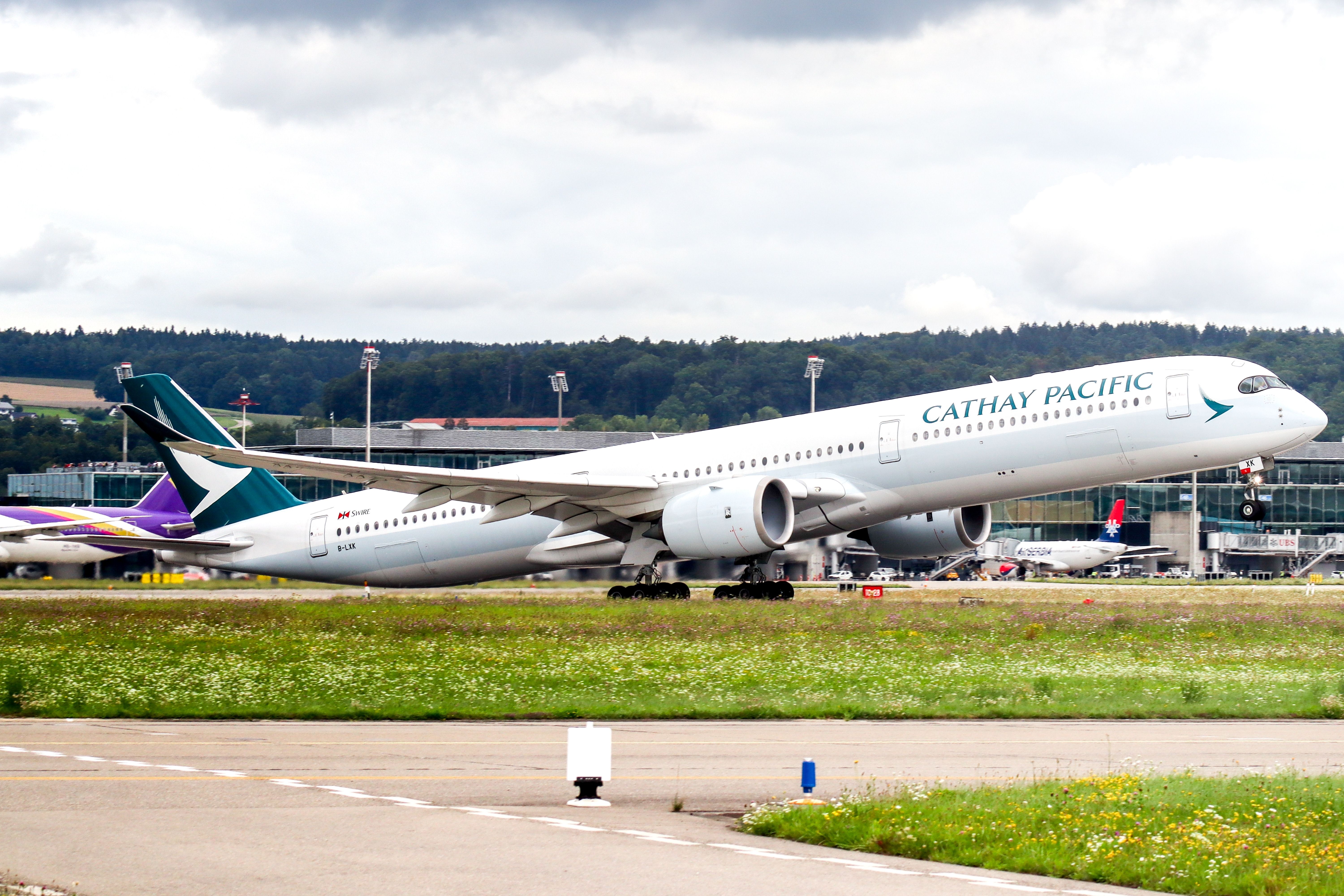 Cathay Pacific Airbus A350-1000 taking off from Zurich Airport.