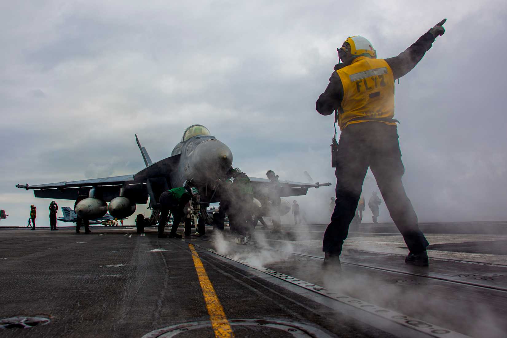 FA-18E Super Hornet, attached to Strike Fighter Squadron (VFA) 151, on the flight deck of the Nimitz-class aircraft carrier USS Abraham Lincoln (CVN 72) .