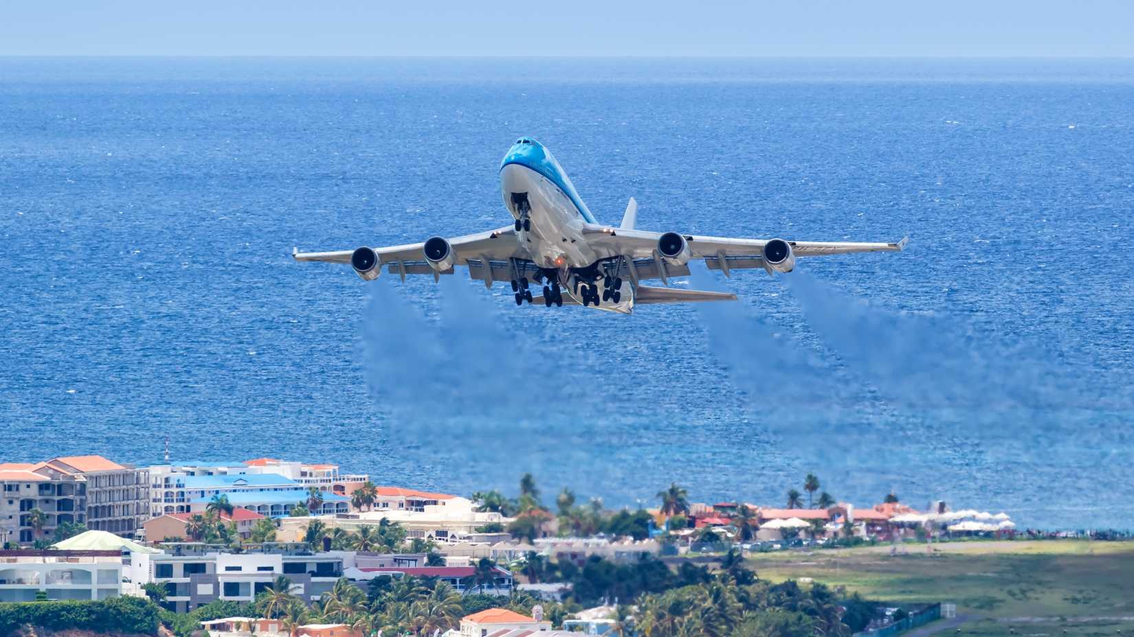 KLM Asia Boeing 747-400 airplane at Sint Maarten Airport (SXM) in the Caribbean.-1