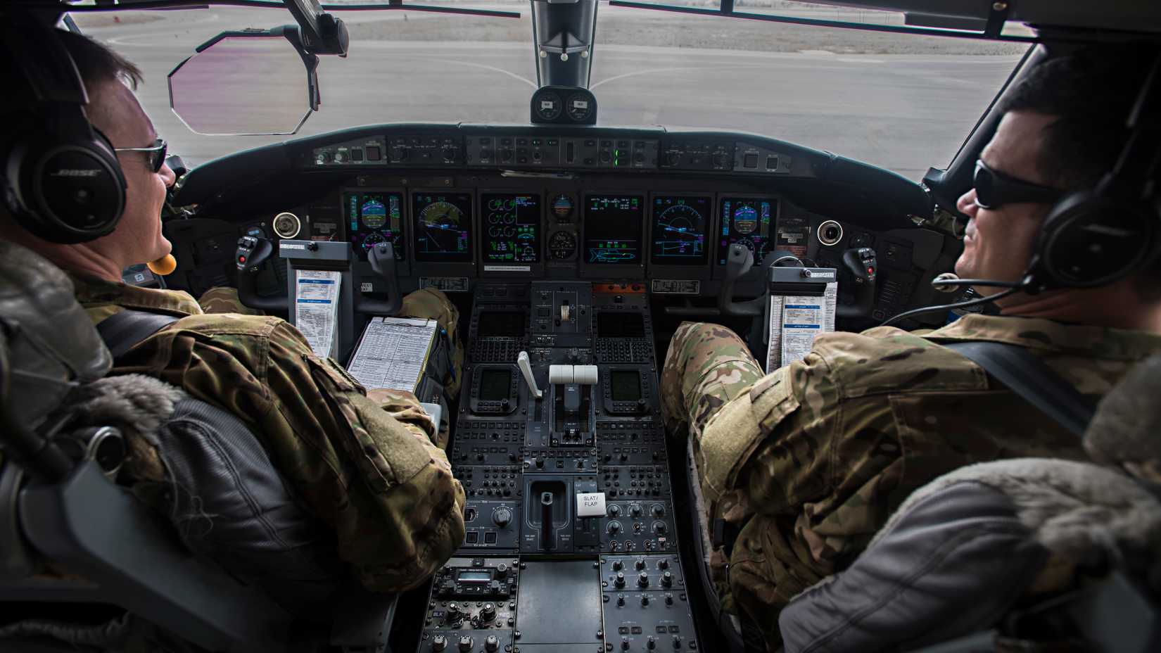 Lt. Col. Chris and Maj. Matt, 430th Expeditionary Electronic Combat Squadron, prepare to fly the Battlefield Airborne Communications Node’s 10,000th mission in the E-11A aircraft, Feb. 24, 2017.