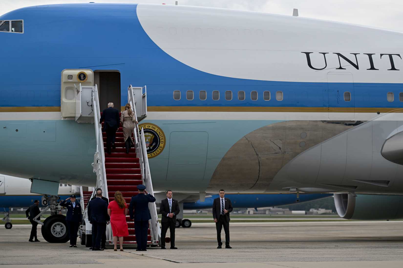 President Donald Trump and first lady Melania Trump board Air Force One at Joint Base Andrews, Maryland, Tuesday, Sept. 16, 2025.