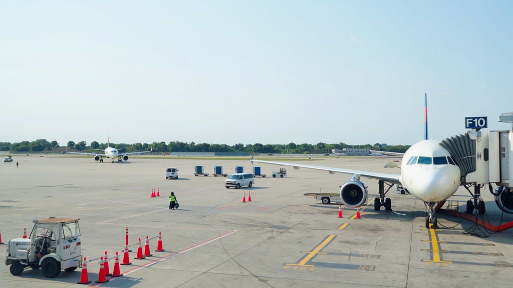Delta Air Lines Plane Parked At Gate