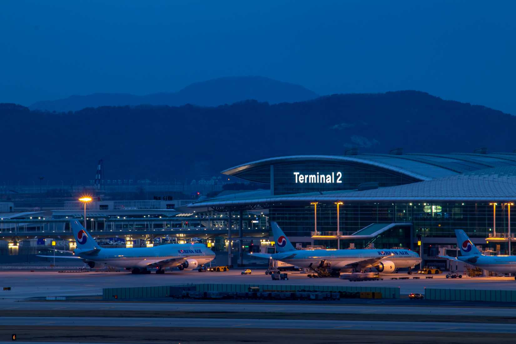 Korean Air aircraft parked at the the gates of the Terminal 2 at Incheon Airport