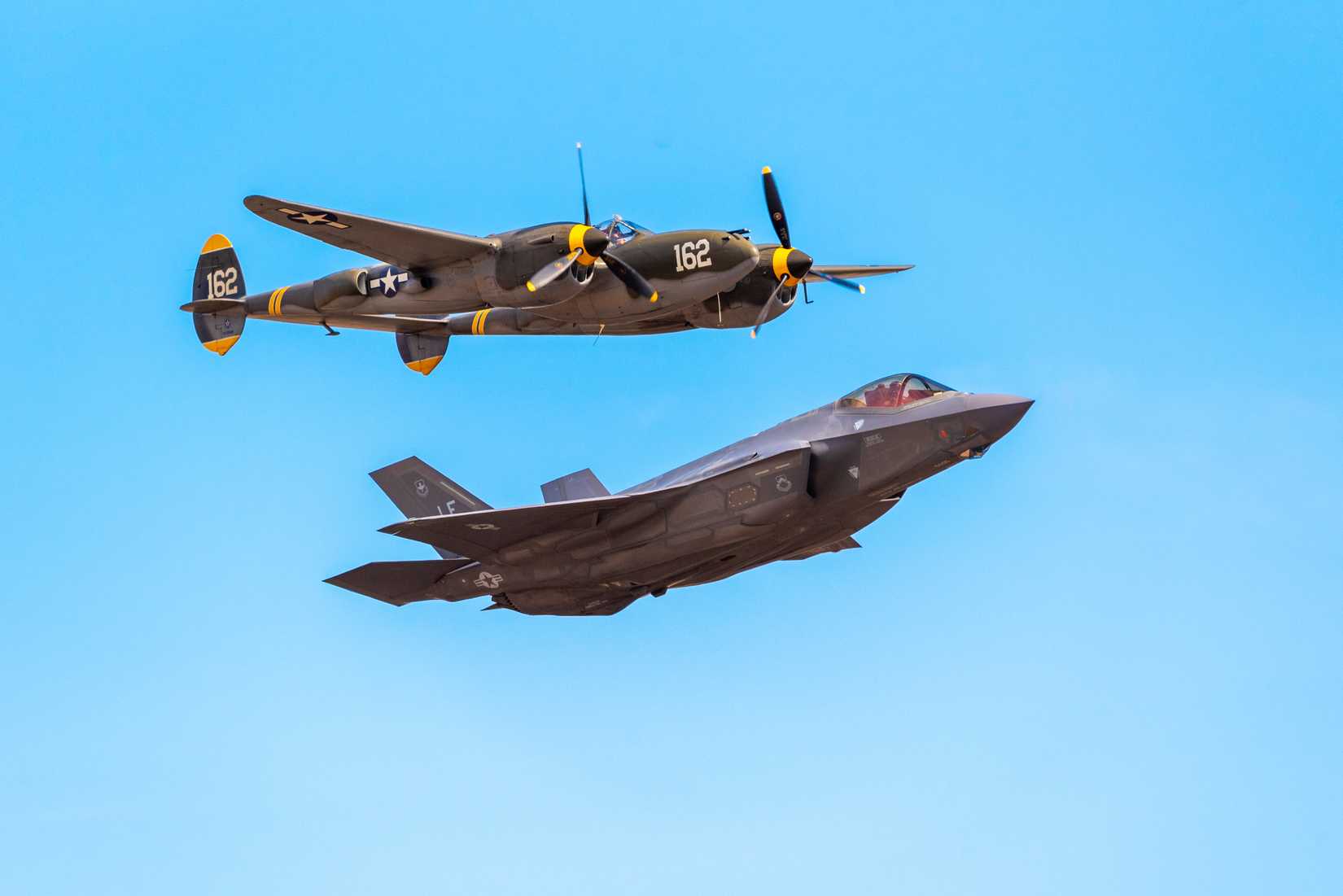 Sacramento, CA USA - October 05 2018: Lockheed Martin F-35 Lightning II and Lockheed P-38 Lightning Heritage Flight Team Demonstration 