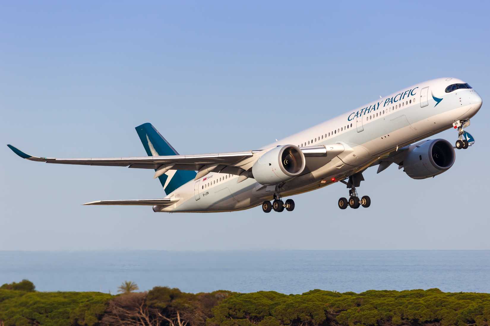 Cathay Pacific Airbus A350 airplane taking off at Barcelona airport in Spain