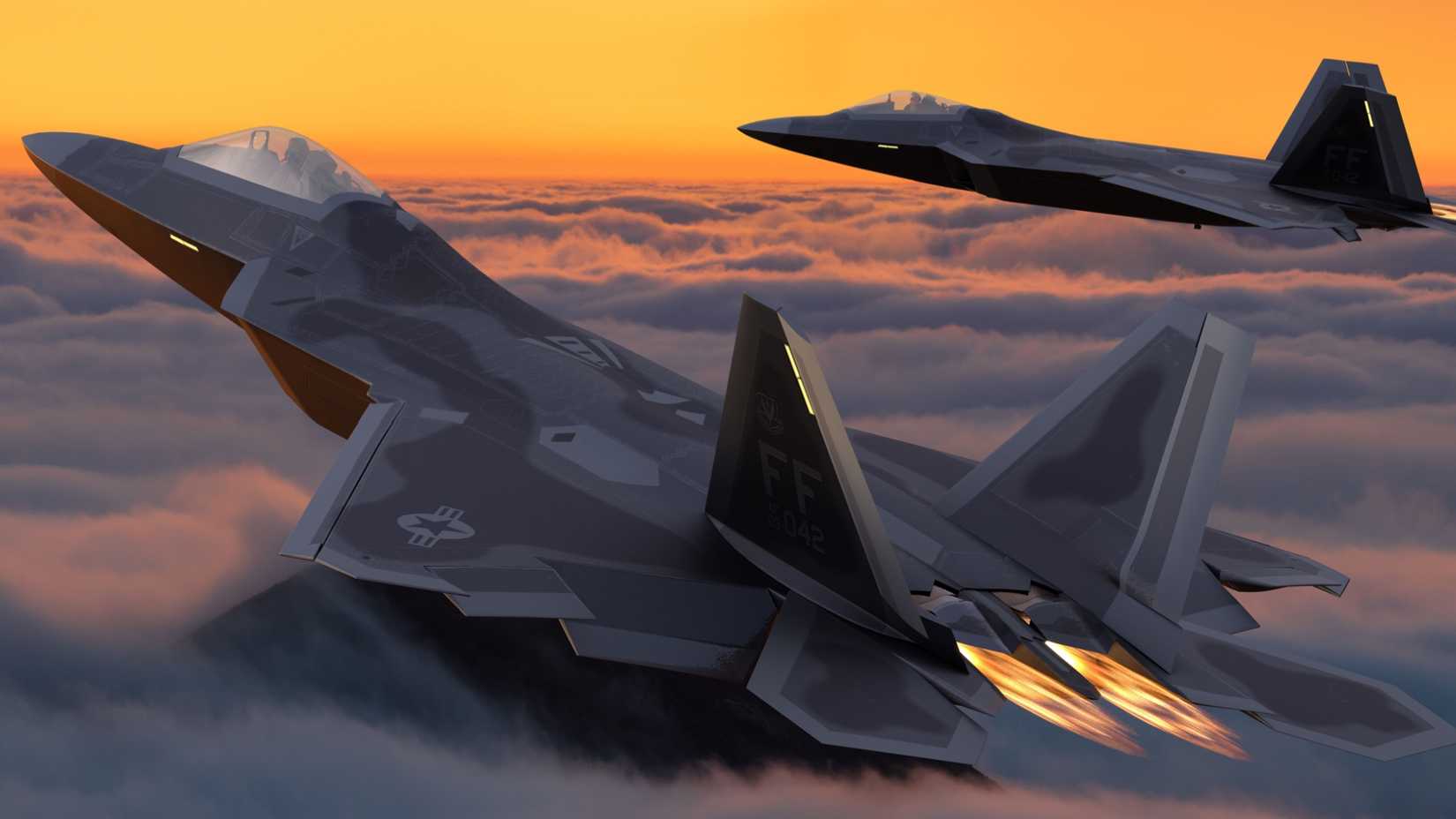 F-22 Raptors In The Skies At Sunset
