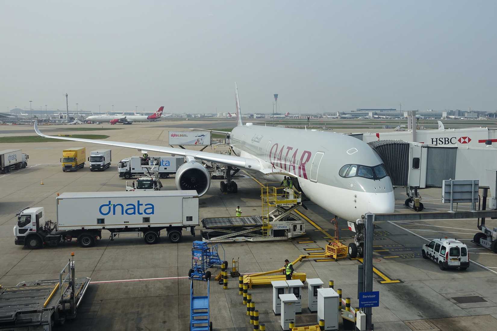 Qatar Airways Airbus A350 with jet bridge at London Heathrow