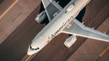 An American Airlines narrowbody aircraft taxiing down the taxiway