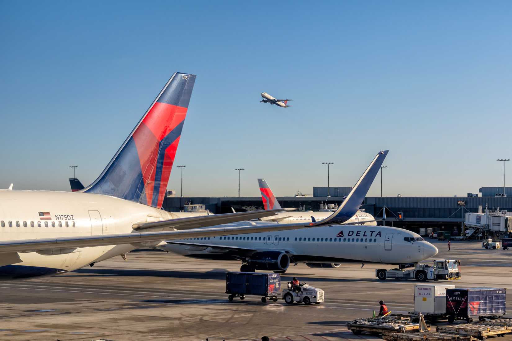 Delta Airlines airplanes pushing out from the gate on Hartsfield-Jackson Atlanta International Airport