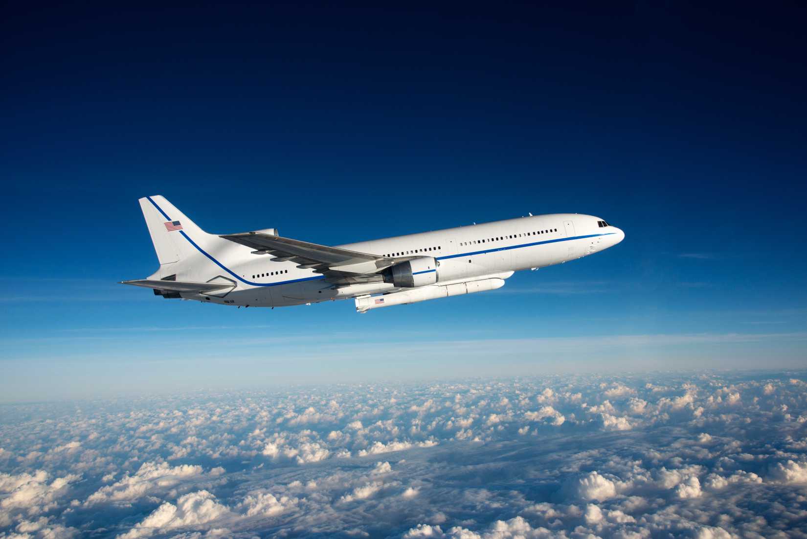 Orbital ATK L-1011 Stargazer aircraft flying over the Atlantic Ocean offshore from Daytona Beach, Florida. USA 