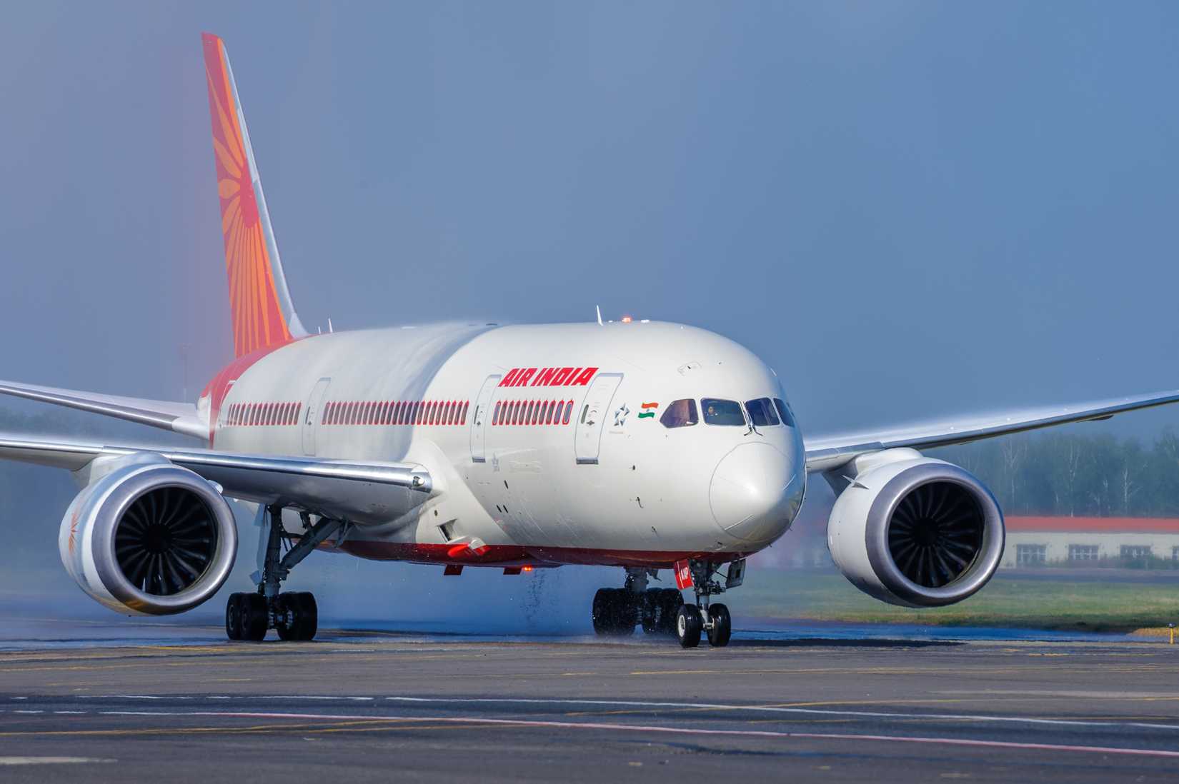 A water salute ceremony on the airport apron to mark the first arrival of Air India's Boeing 787 Dreamliner aircraft with flight number VT-ANP at Moscow Domodedovo Airport, Russia - July 18, 2014