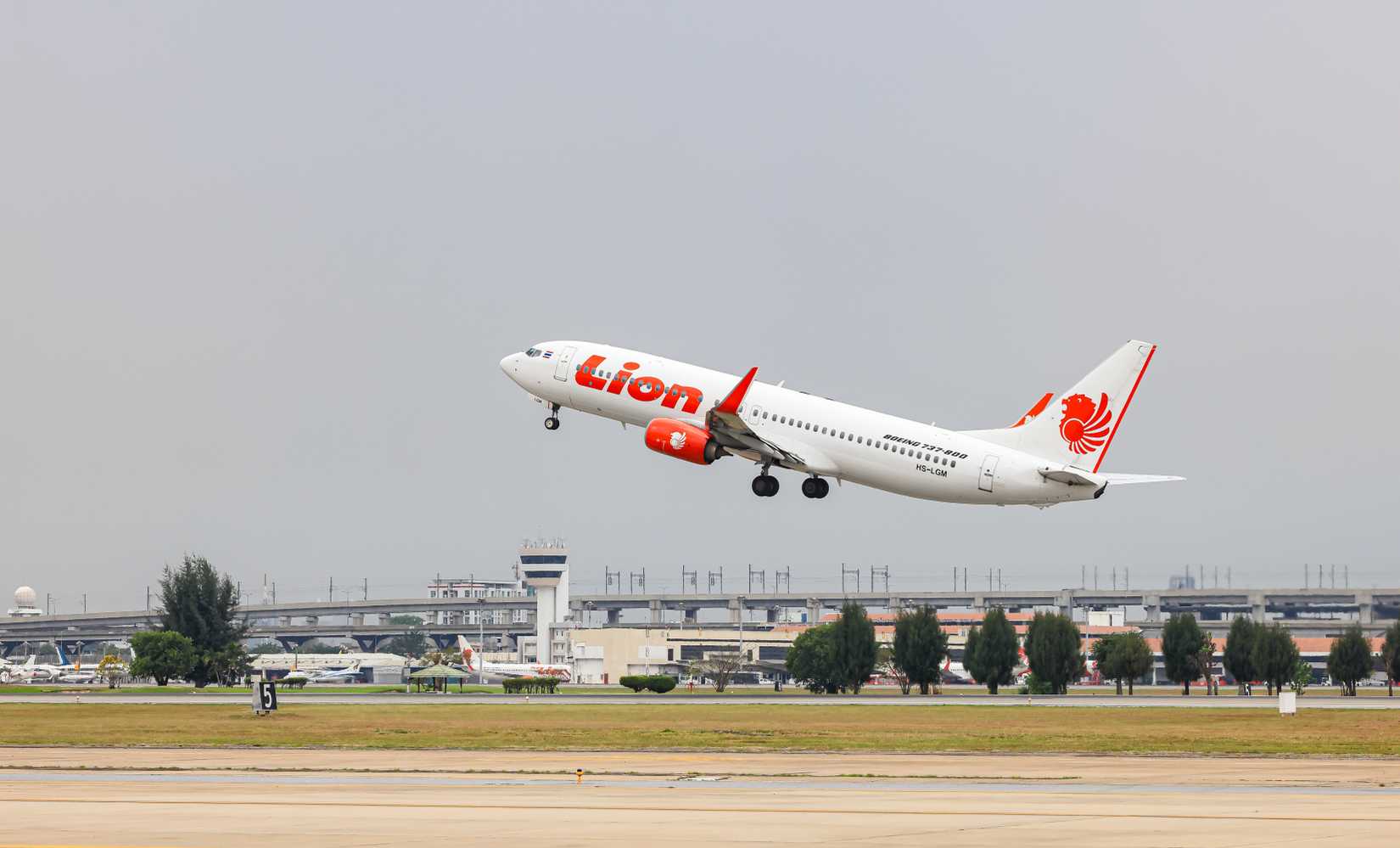 Thai Lion Air Boeing 737-800 takes off from Don Mueang International Airport.