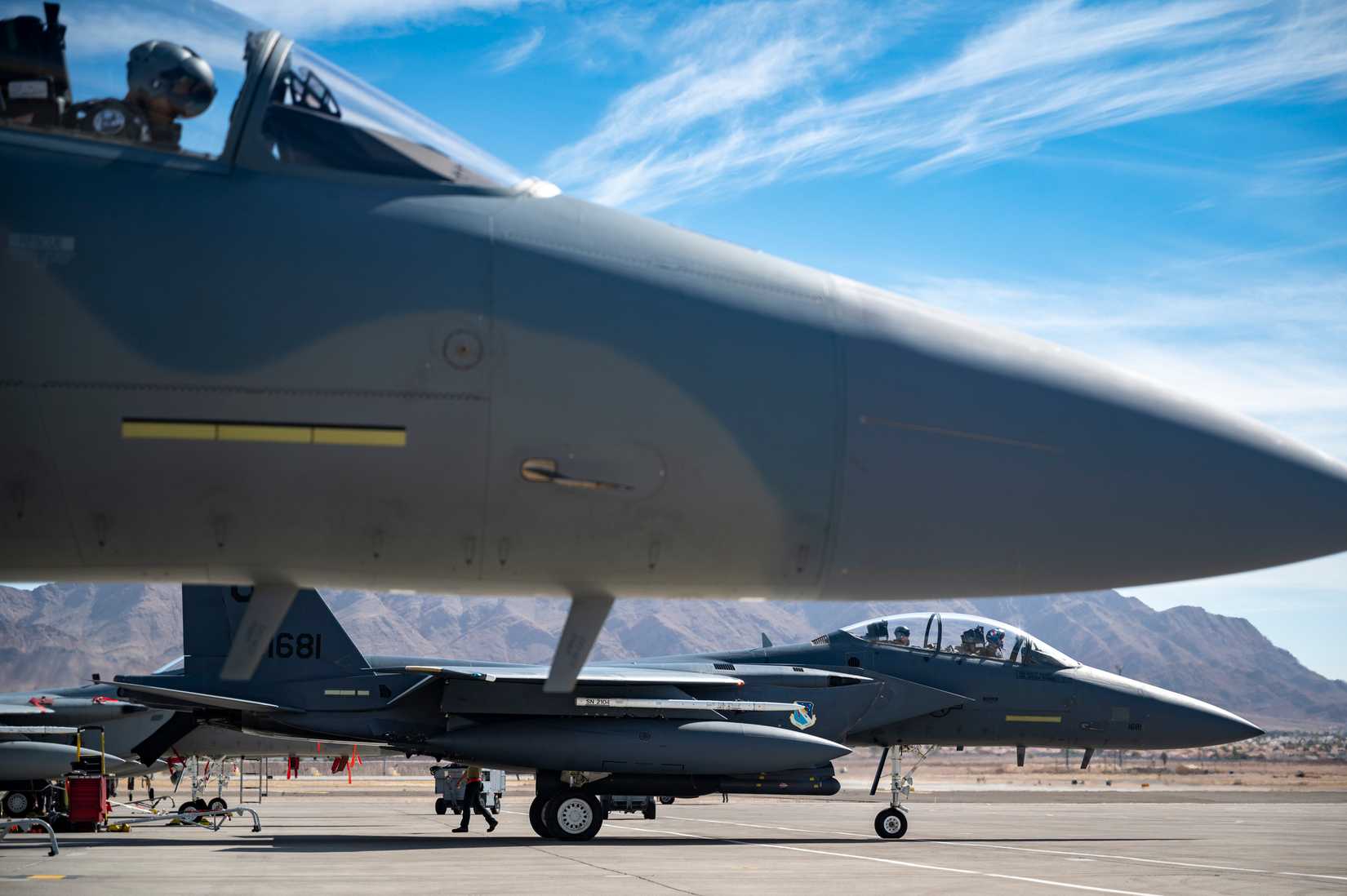 85th Test and Evaluation Squadron pilot, waits in an F-15EX as an F-15E Strike Eagle assigned to the 53rd Fight Wing.