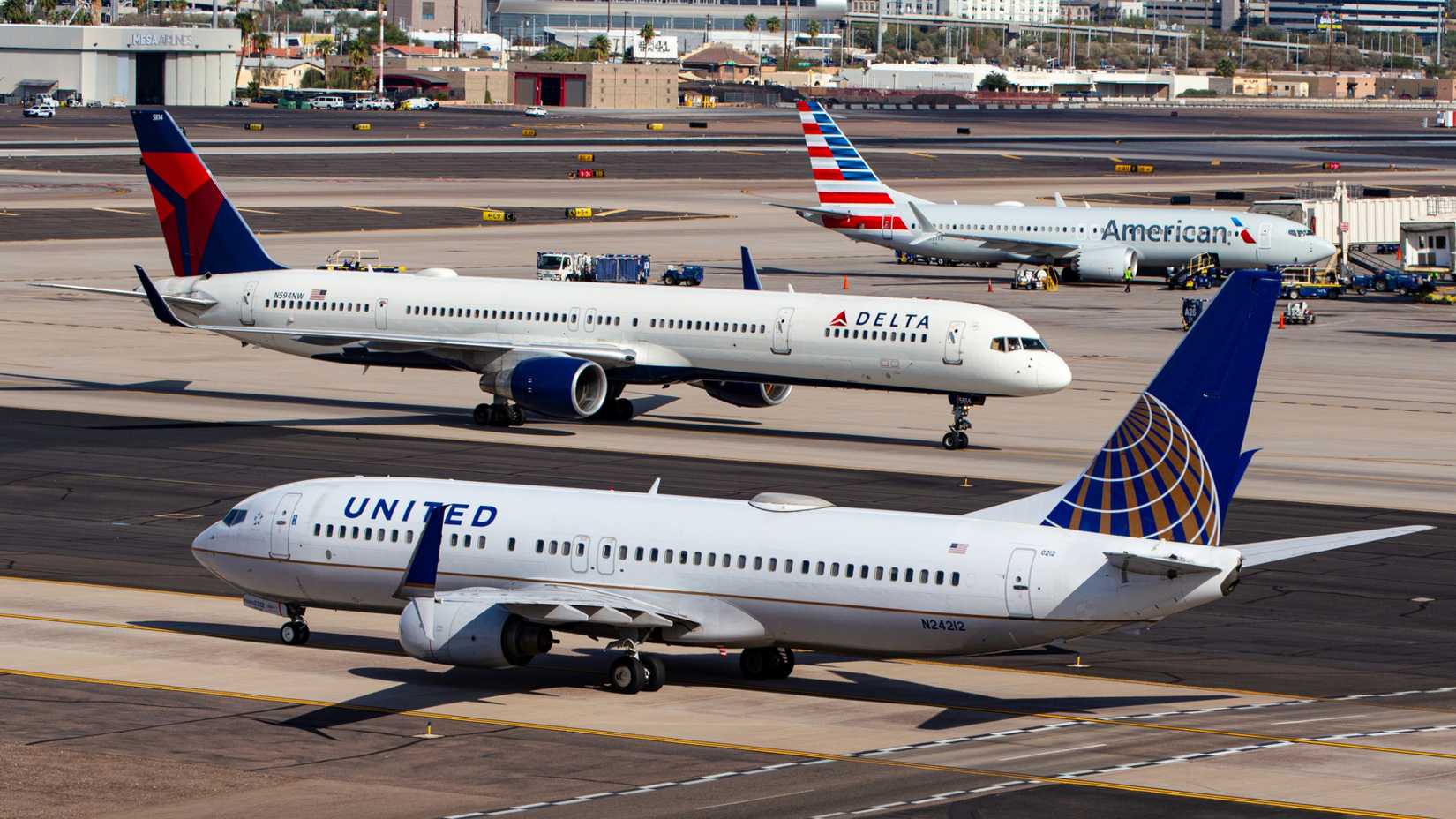United Airlines, Delta Air Lines, and American Airlines aircraft at the Phoenix Sky Harbor International Airport