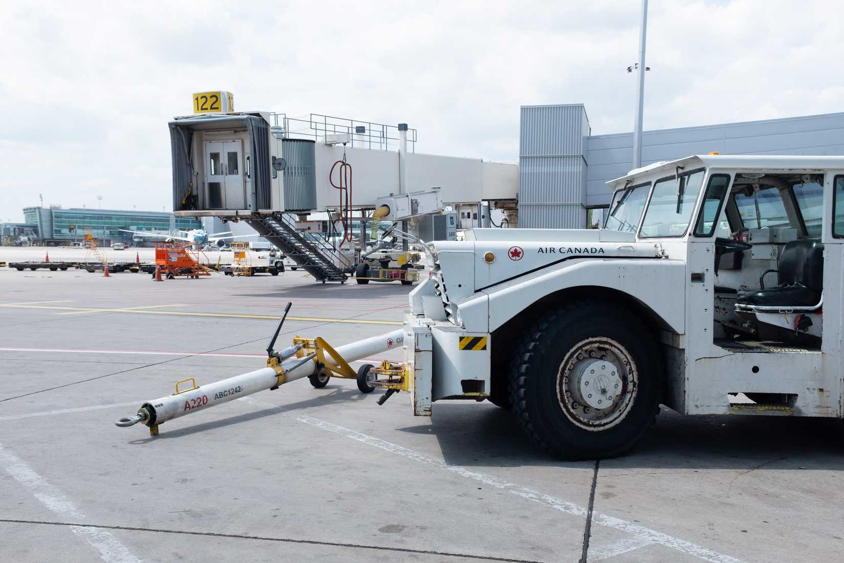 Air Canada aircraft tug sitting on the tarmac of Pearson international airport in Toronto Canada